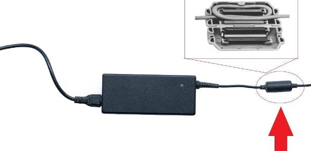 o que é aquele cilindro no cabo do seu notebook