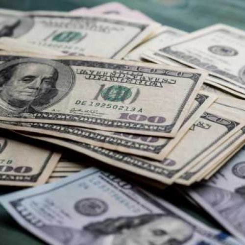 DXY Edges Lower Amid Dovish Shift in Fed Tone